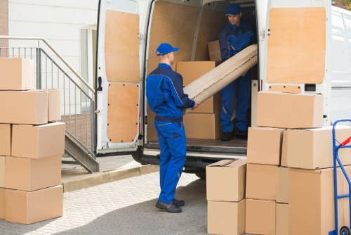 Man and van loading household items in Harrow