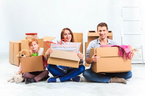Unloading and setting up office items at a new workspace in Harrow