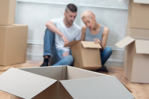 Student boxes and small furniture prepared for a Harrow relocation