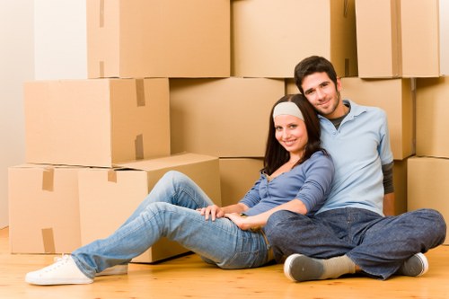 Removal team planning a house move in Harrow with boxes and furniture