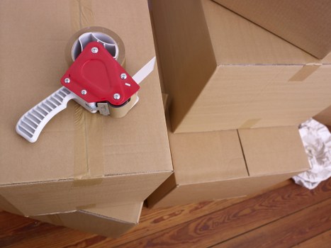 Loading office desks and boxes for relocation in Harrow