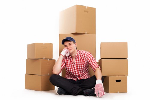 Careful furniture handling during a local house removal in Harrow